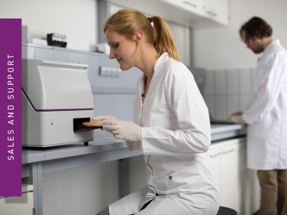 Two BMG LABTECH employees in the laboratory