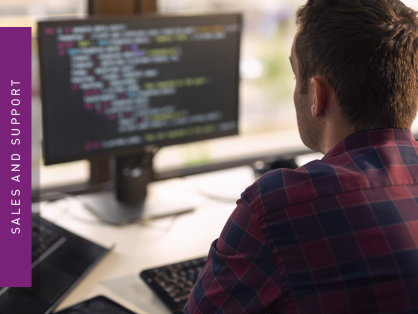 A person in front of a monitor