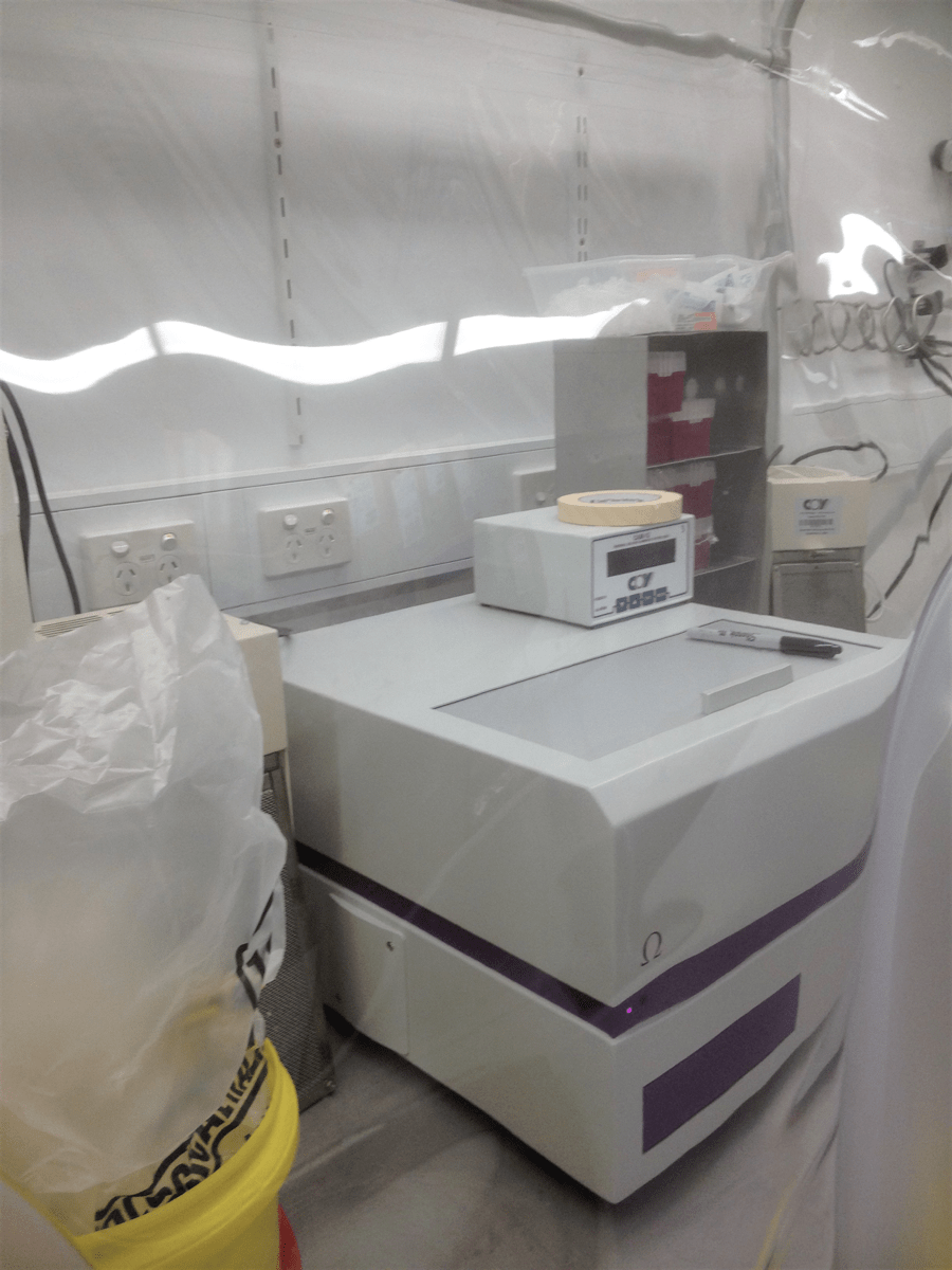 Fig. 1: Close-up FLUOstar Omega microplate reader positioned in an anaerobic chamber